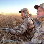 Montana waterfowl hunting participants sitting and watching